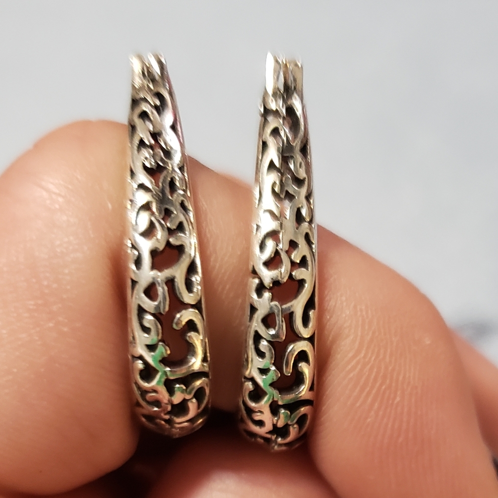 Silver Celtic design hoop earrings